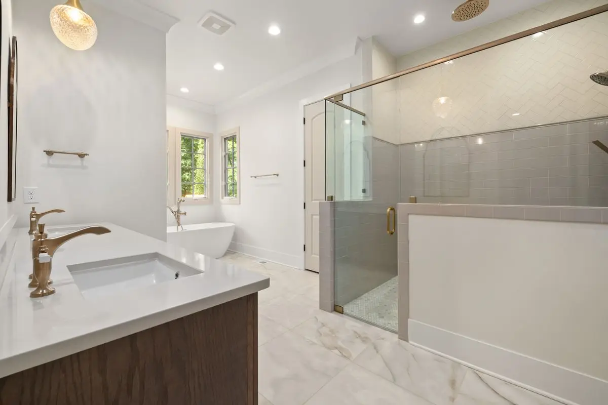 A clean, well-lit residential bathroom. Reno.